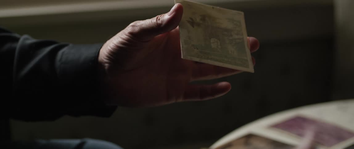 A footage of a person holding a picture