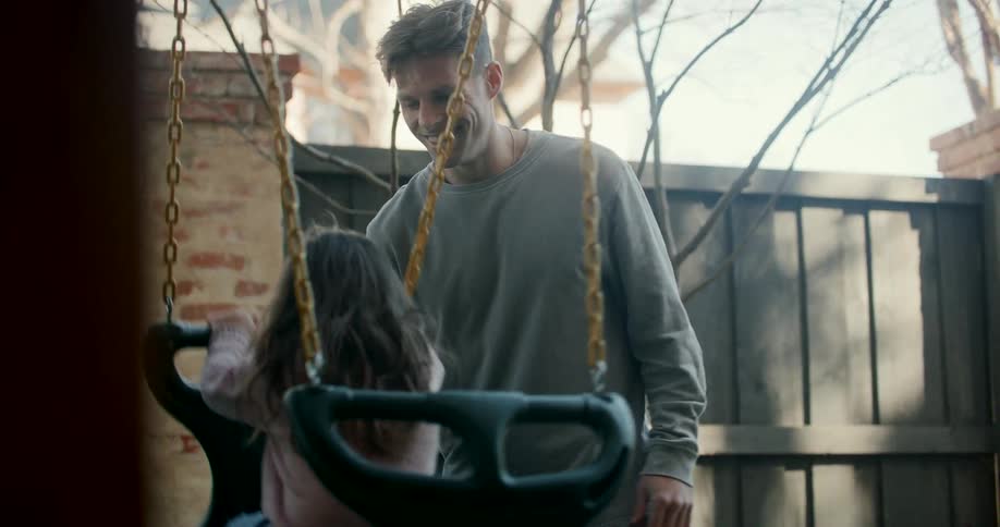 A footage of a man playing with a girl