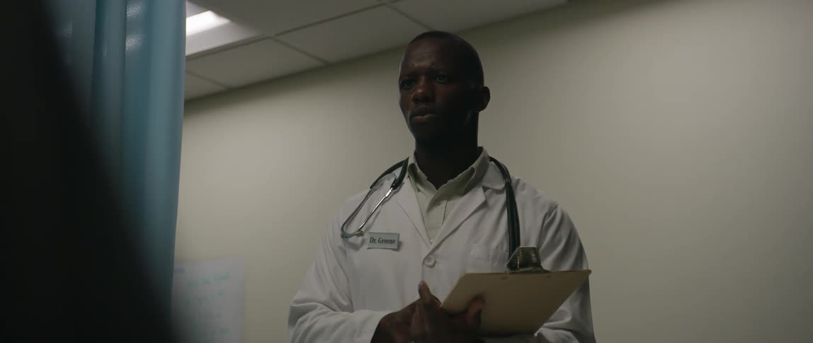 A doctor walks away slowly