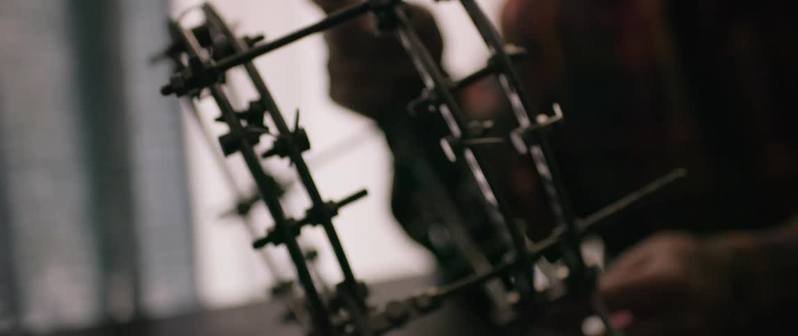 A man is holding a medical brace