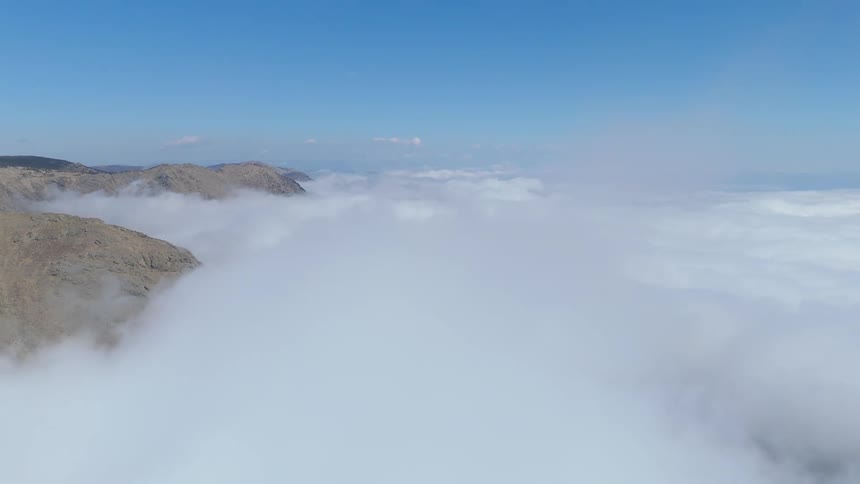 Aerial view of a sea of clouds in the mountain peaks