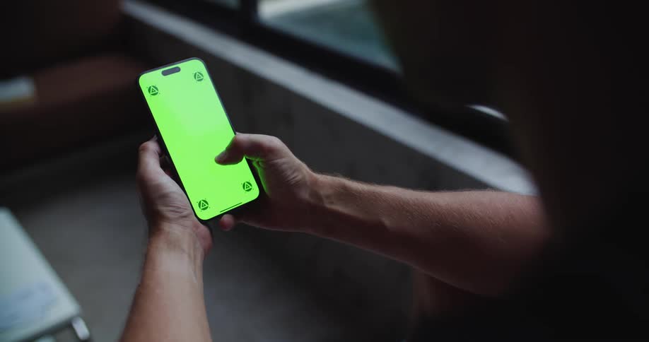 Pair of hands interacting with a smartphone