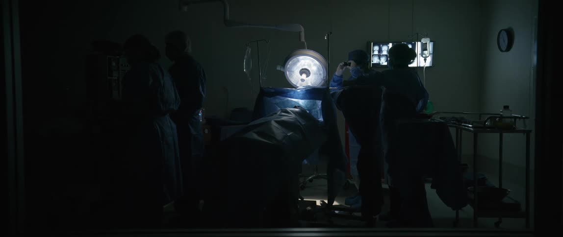 Hospital staff prepare for surgery in the operating room