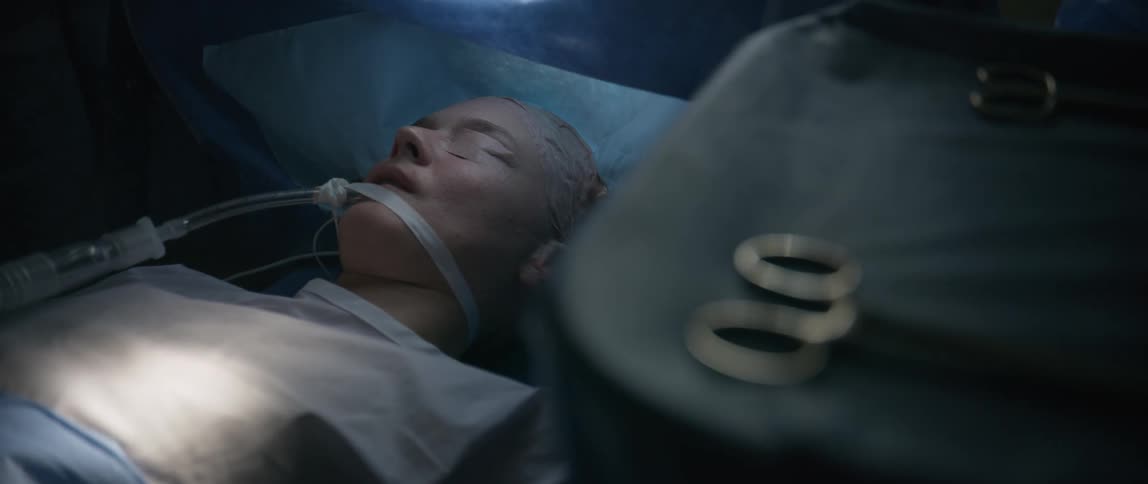 A person receives medical attention from medical professionals