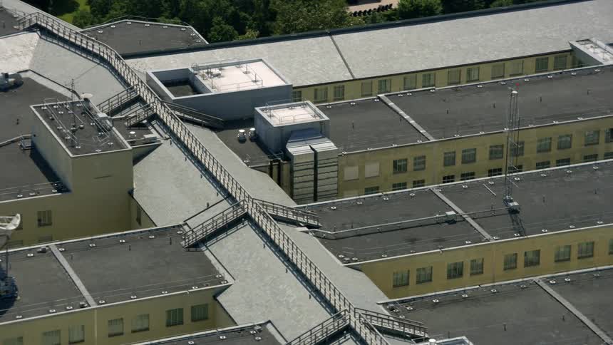 The rooftops of buildings are shown below