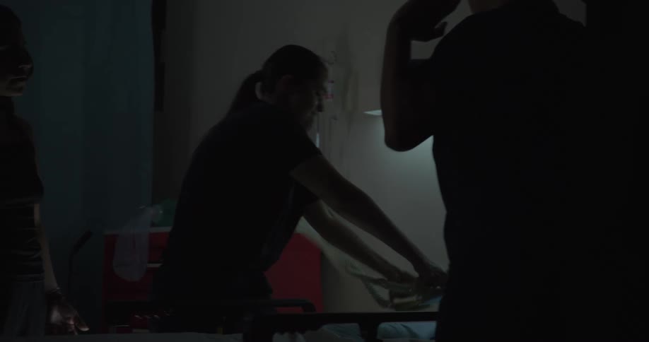 Chest compressions and shock defibrillation is being used on a patient