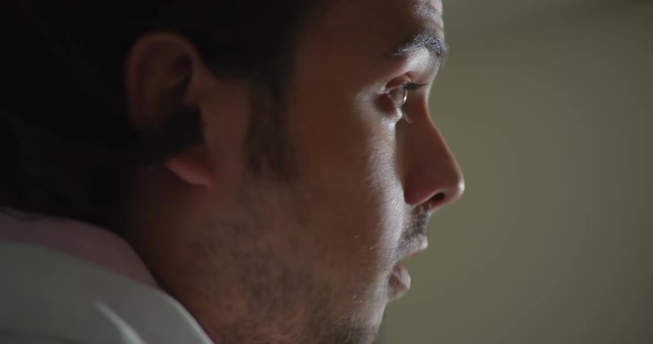 Male doctor talking to another person