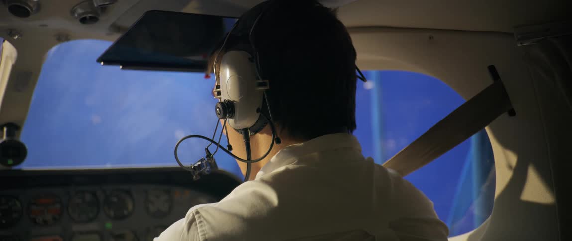 Pilot in an airplane cockpit