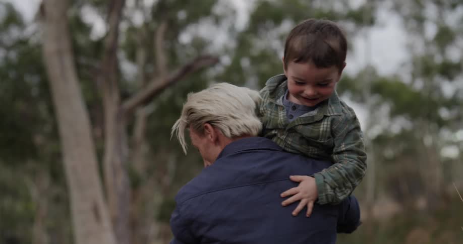 A footage of a man playing with his kid