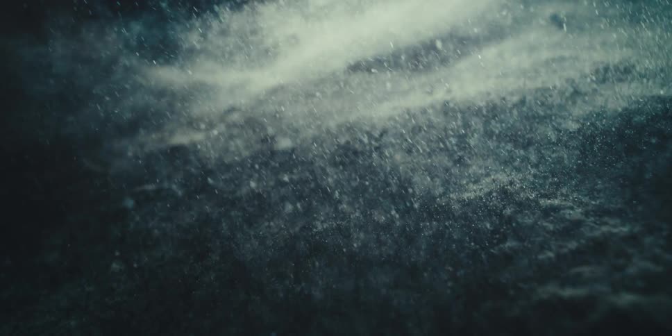 The sand is exploding and flying everywhere