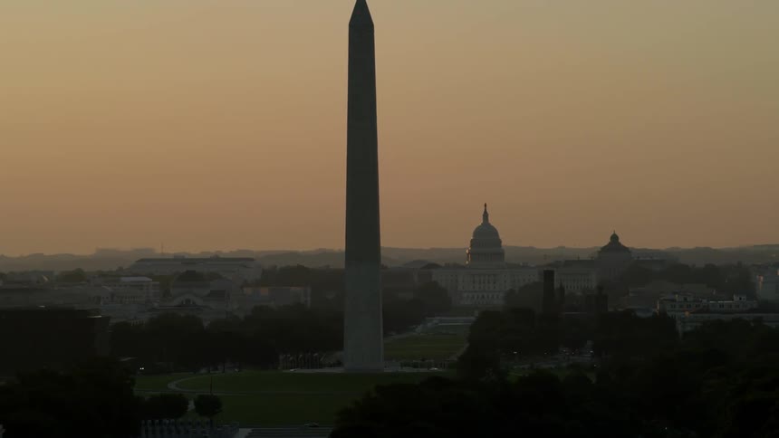 View of the washington monument at sunset