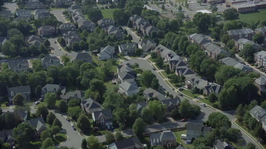 Aerial view of a city with many houses