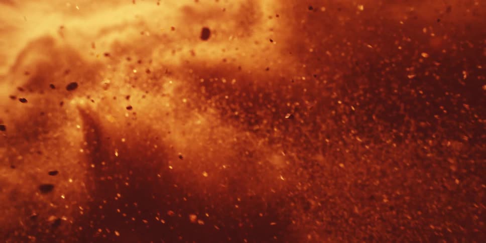 Cloud of debris explodes into the air during a cataclysm