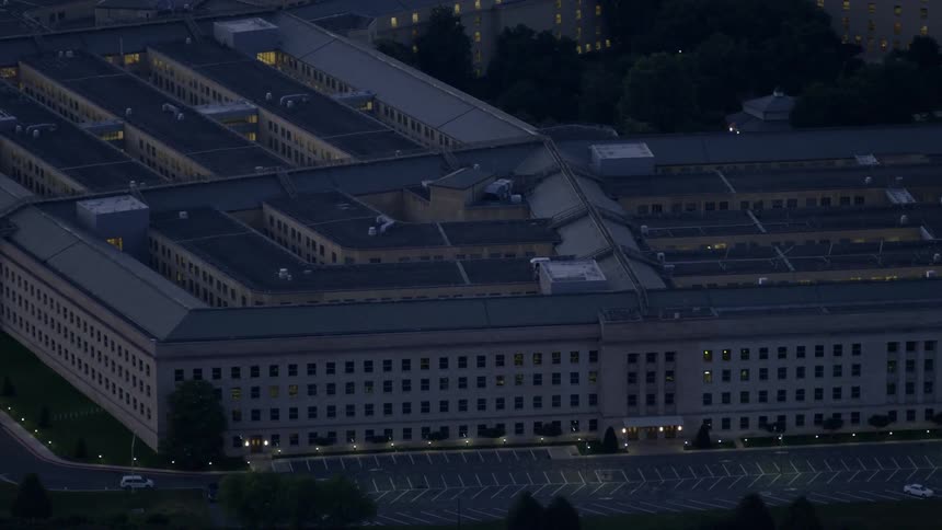 Lights shine from the pentagon at night