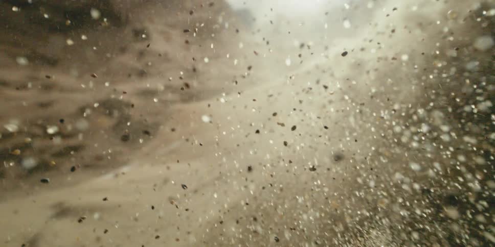 The sand flies up in the high wind