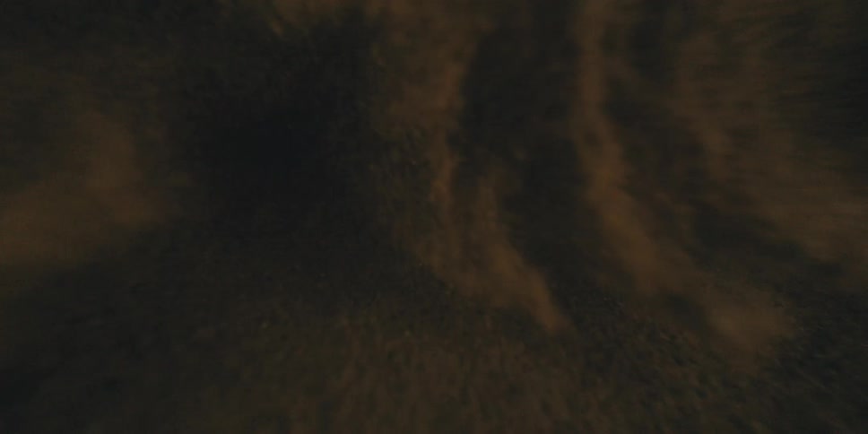View of sand clouds shifting from inside a desert sand storm