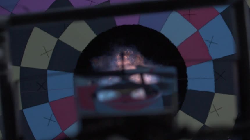 A flame is burning up into a hot air balloon