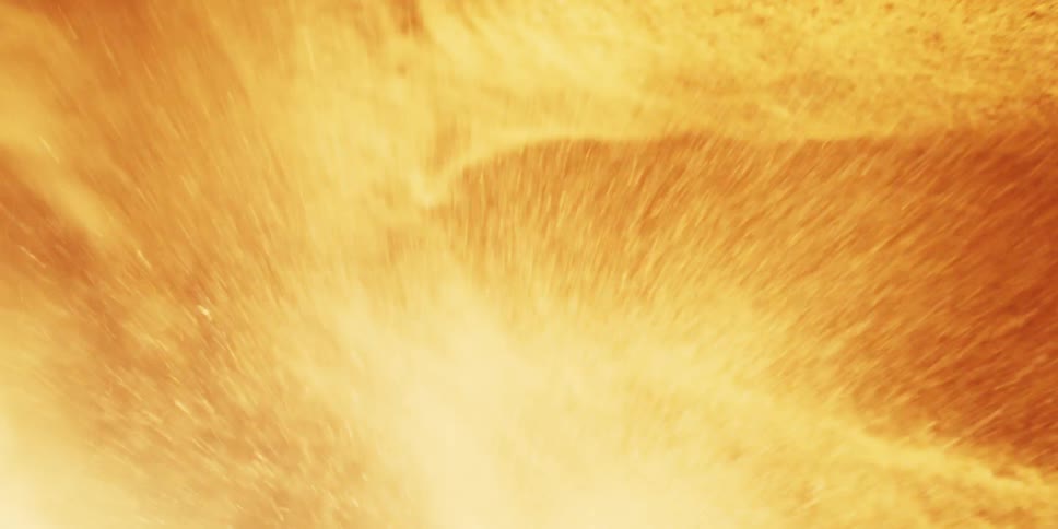 Moving Through a Curtain of Glowing Sparks and Fiery Particles