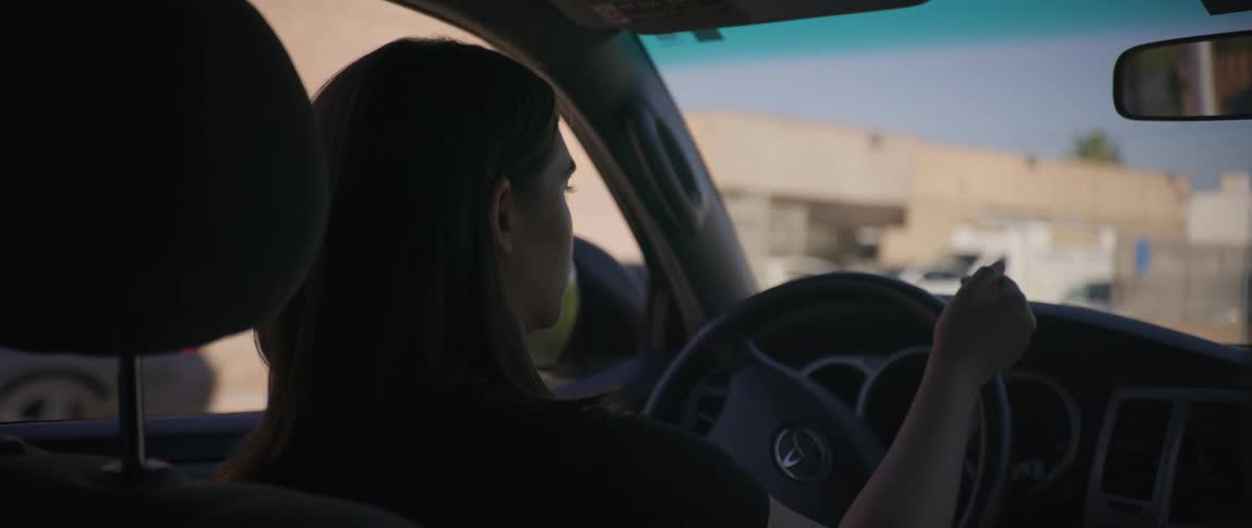 Woman driving a vehicle