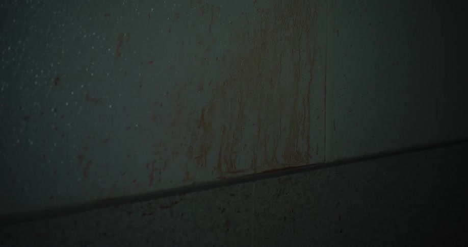 Blood splattered on a corner of a wall