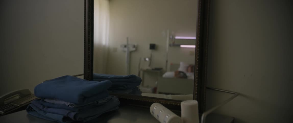 A patient lays in a hospital bed