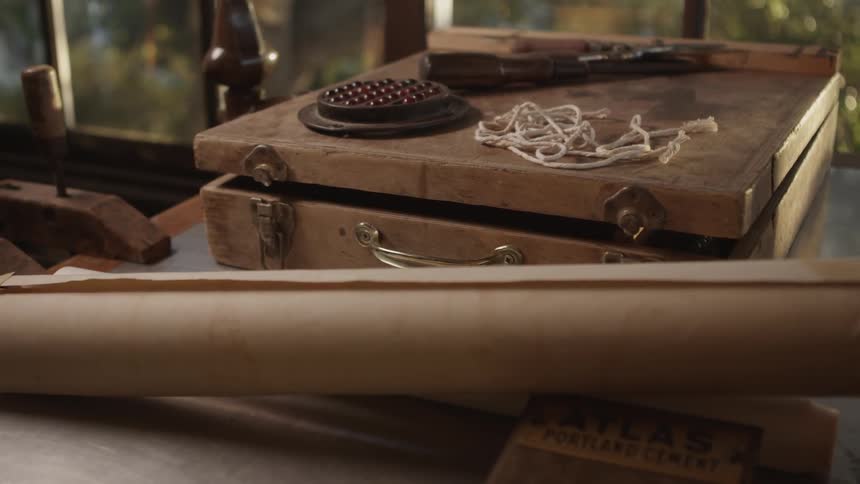 Box with objects on top of it on a table