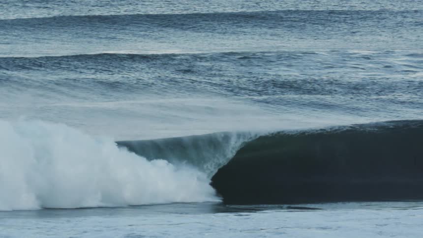 A tubeshaped wave in the sea