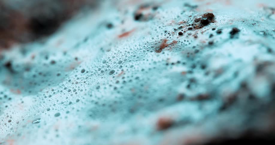 An extreme close up of some soapy foam