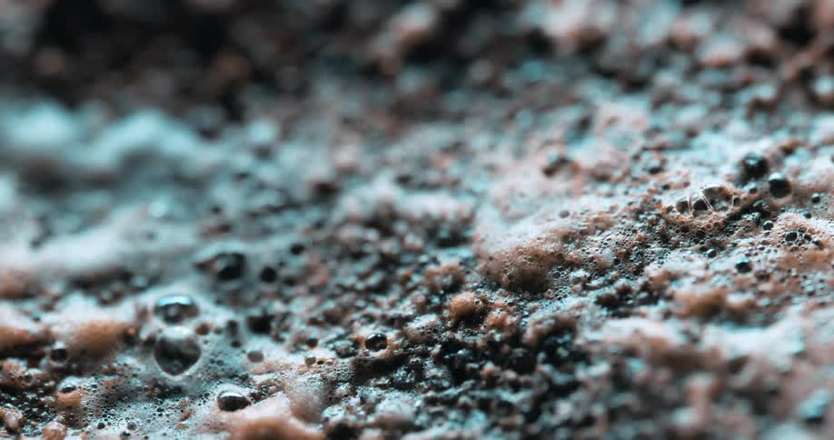 Foam covering a granule covered surface evaporates during the daytime