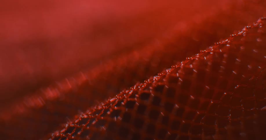 The red fabric has mesh on it