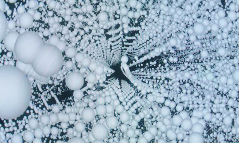 The screensaver has white orbs moving together