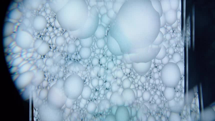 The digital artwork has many orbs floating up