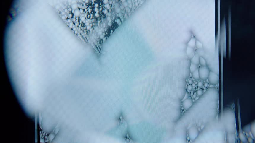 Abstract overlapping white balls in an infinite loop