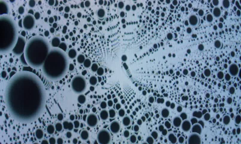 The screensaver is full of repeating dots moving