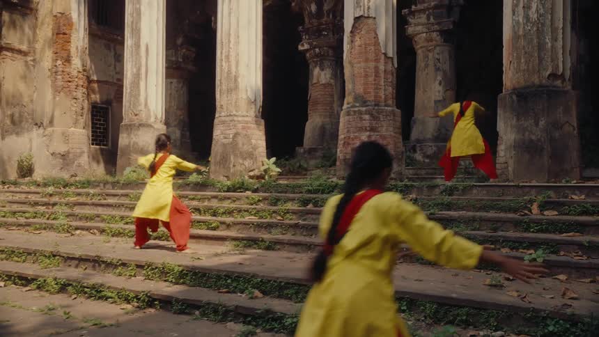 Women in a temple doing a dance
