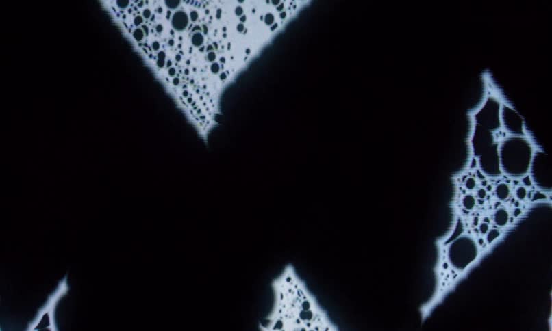 The orbs spin and move forward on the screensaver