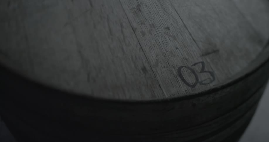 Close up of a barrel with the number 03 on it
