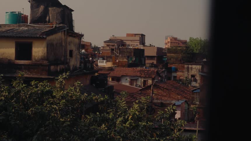 Multistoried slum housing in a large city on a sunny day
