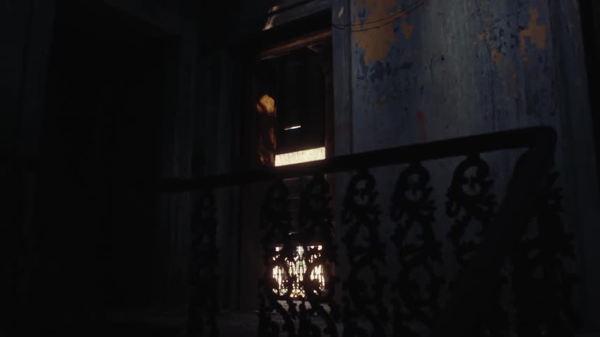 A dimly lit decaying interior with faint light filtering through a cracked window casting eerie shadows on an ornate iron railing