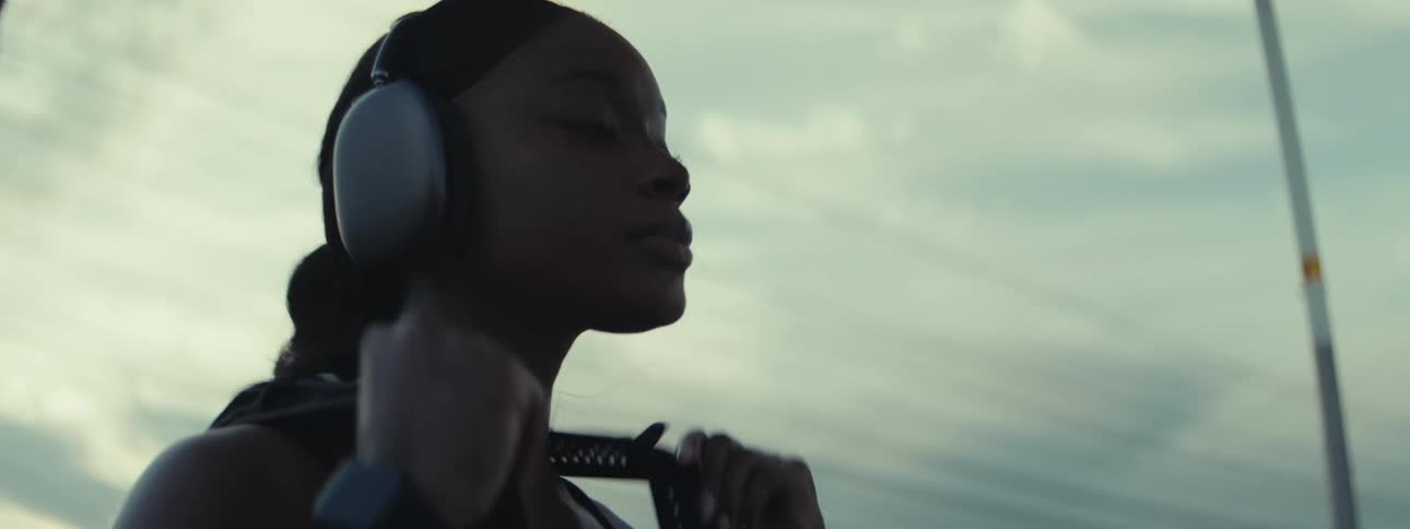 Woman outdoors with headphones