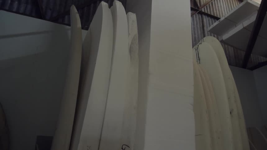 Wood stacked up ready to be made into surfboards