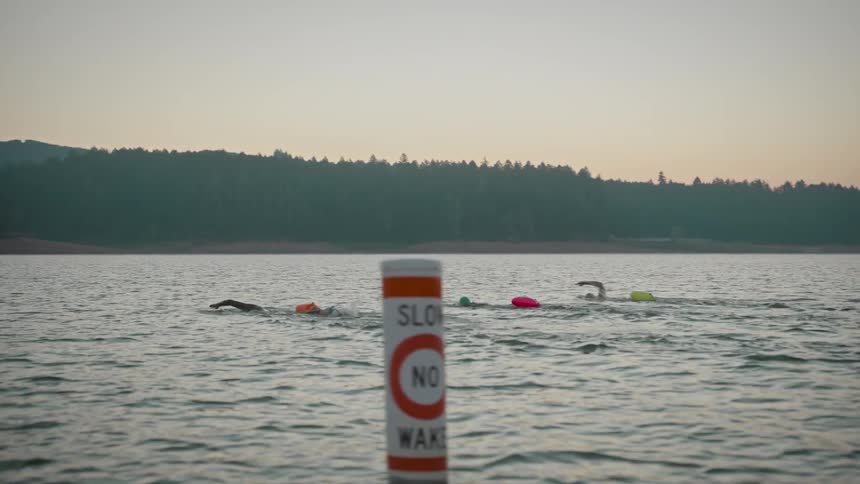 A footage of people swimming the river