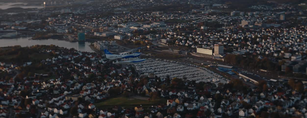 The plane glides over the city