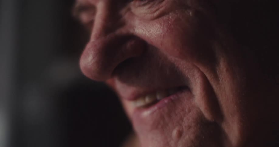 Close up of a happy elderly mans mouth