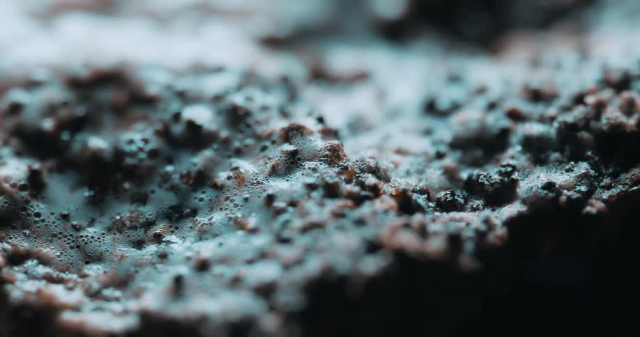 Abstract surface of stones with erosions and foam