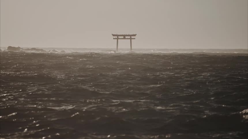 Fog is hanging over the rough waters
