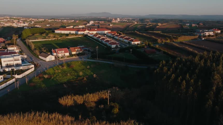Homes are around the landscape of farms