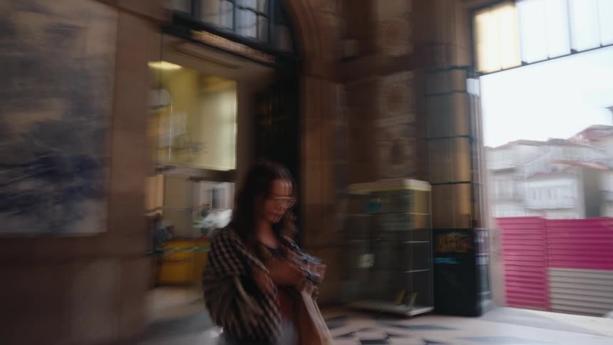 Woman showing a photograph on a professional camera