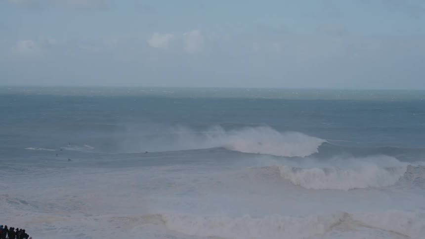 Very strong waves are crashing on the shore