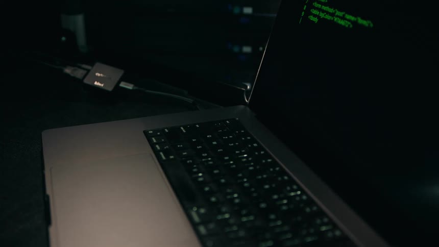 A man rebooting a laptop